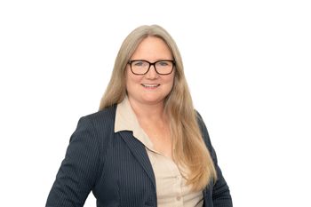 Portrait of Michelle Origer, REALTOR®.